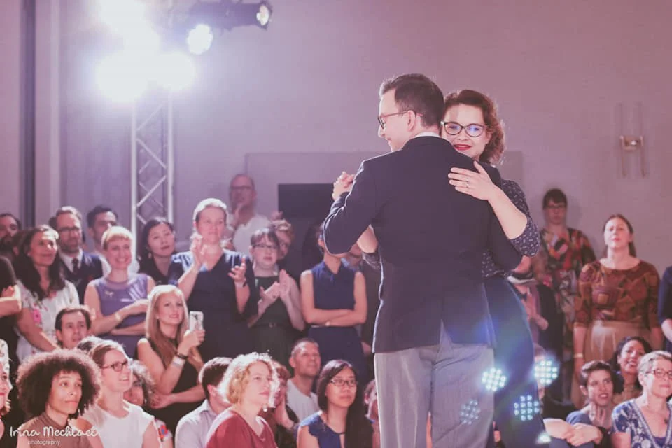 Yulia and Sasha dancing Balboa in front of an audience